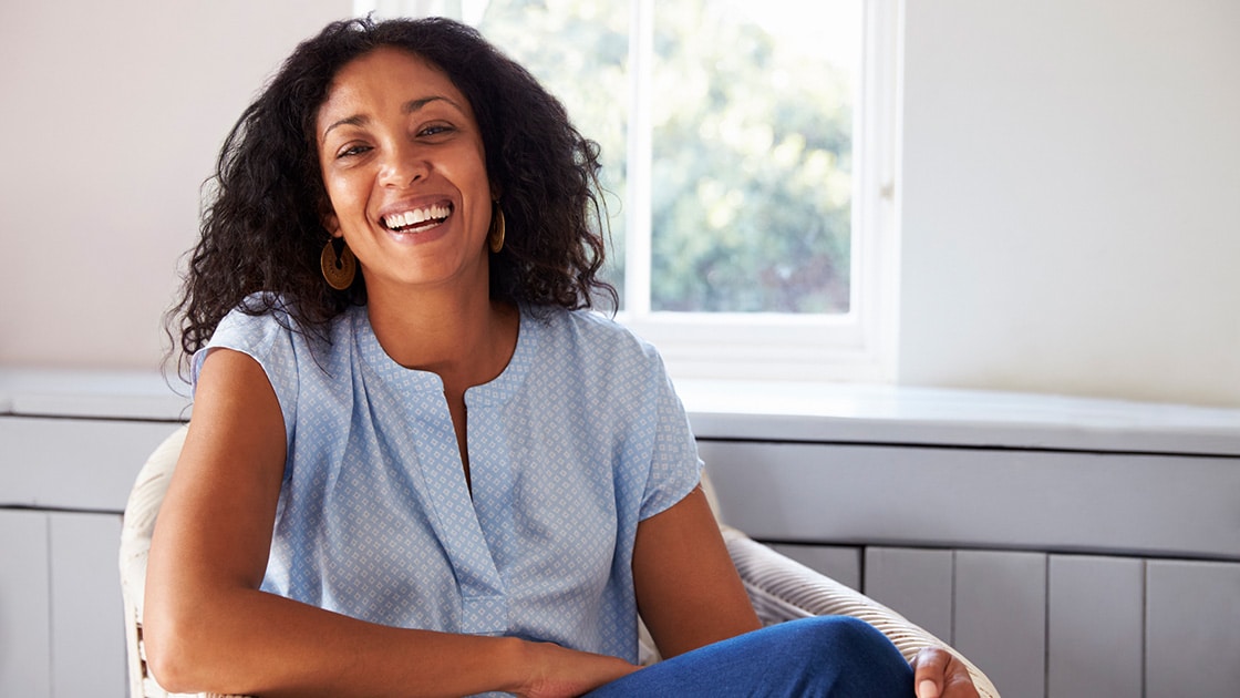 Woman in chair smiling